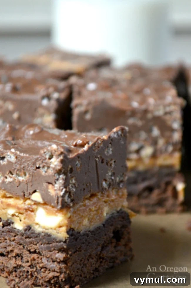 Stacked Peanut Butter Crunch Brownies 6 Layered peanut butter brownies close
