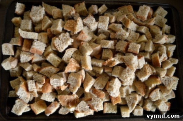Homemade bread cubes prepared for Sausage-Cranberry Stuffing.
