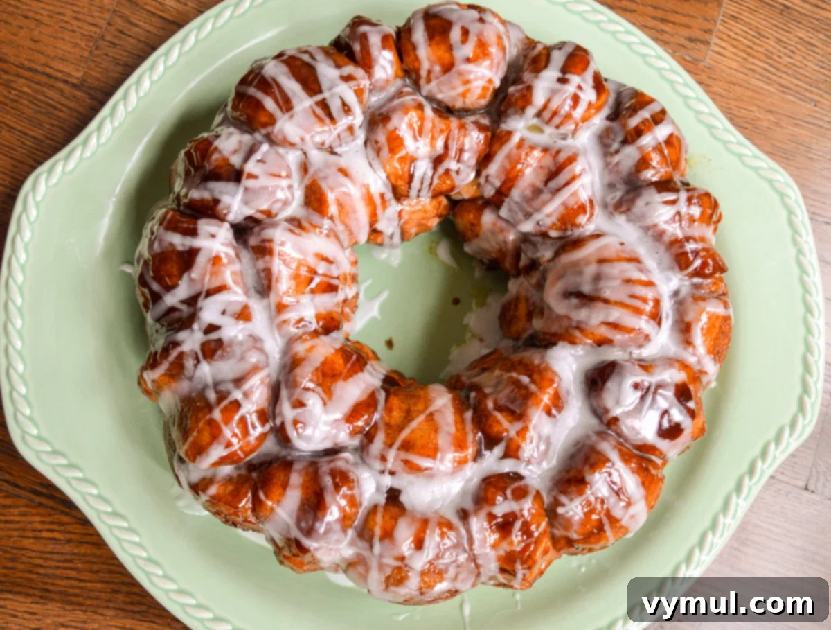 glazed monkey bread above on green platter, ready to be served