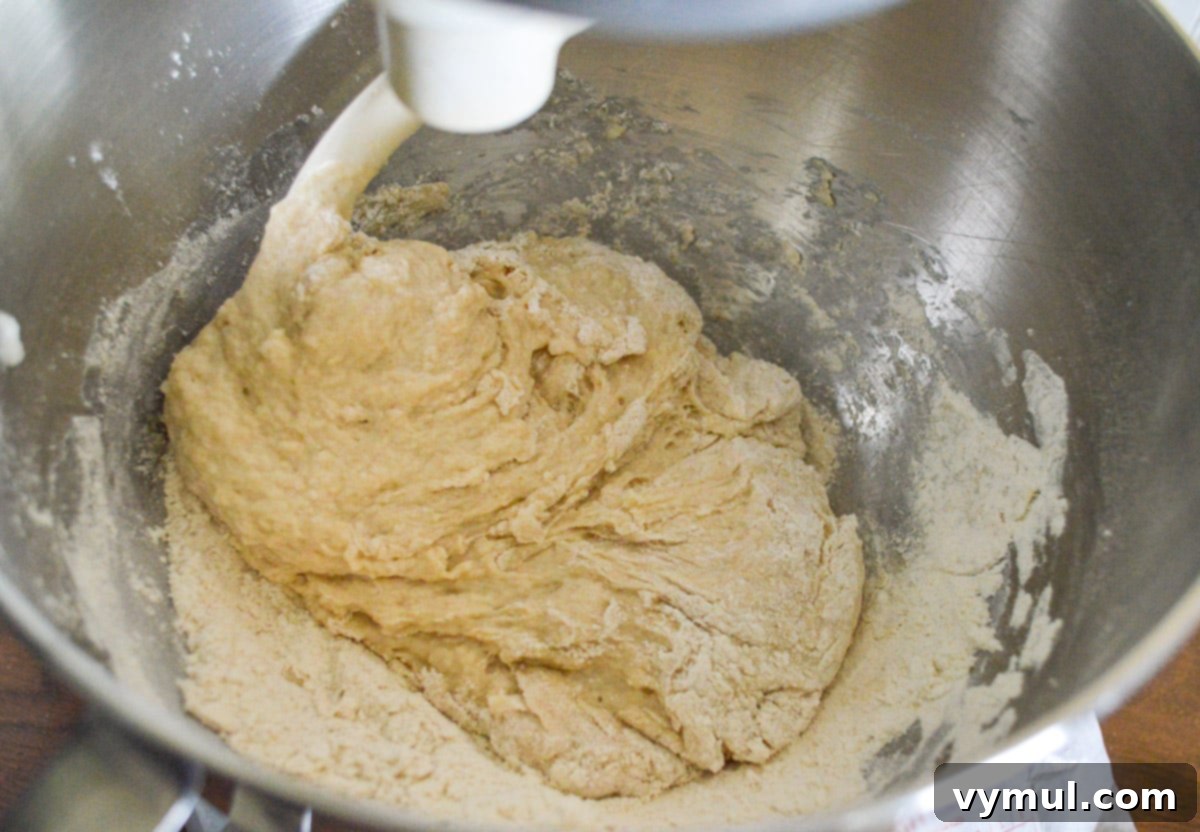 starting to mix the monkey bread dough in stand mixer with dough hook