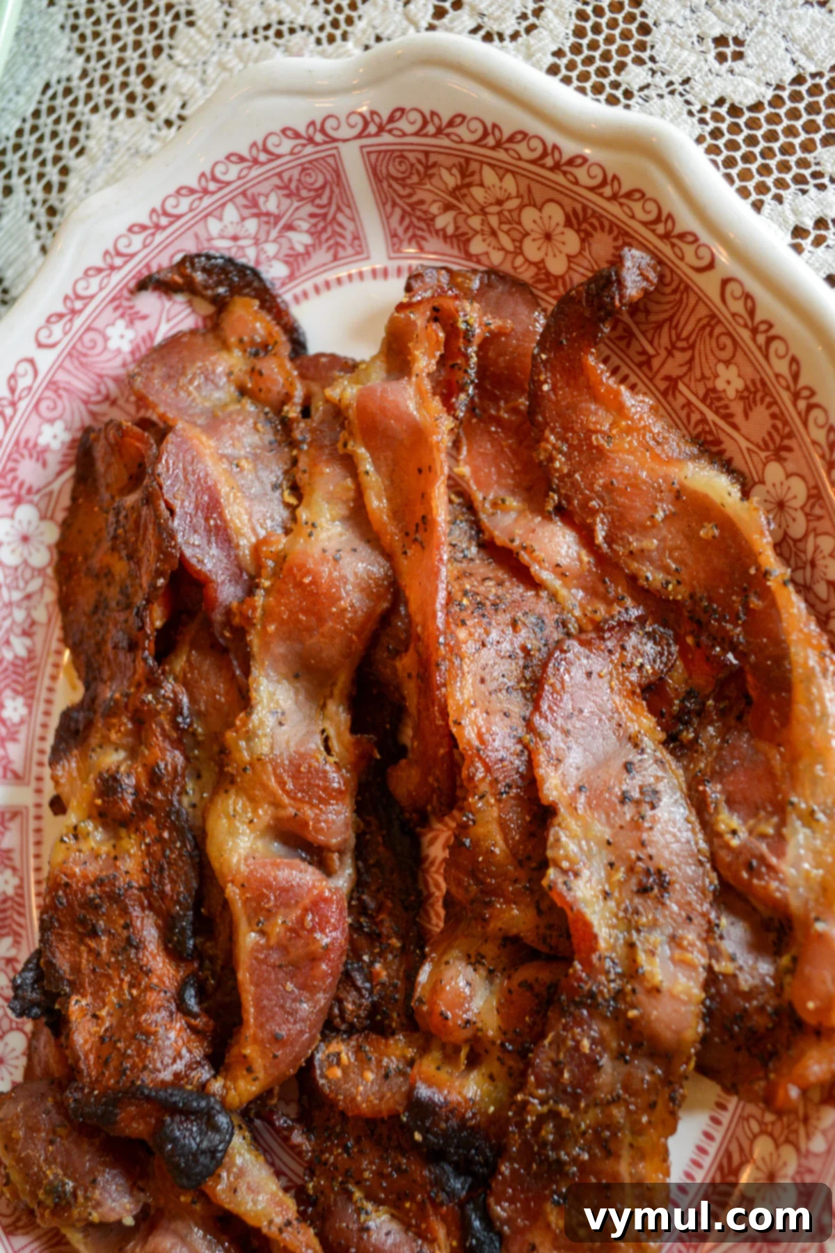 cooked maple mustard bacon on platter from above