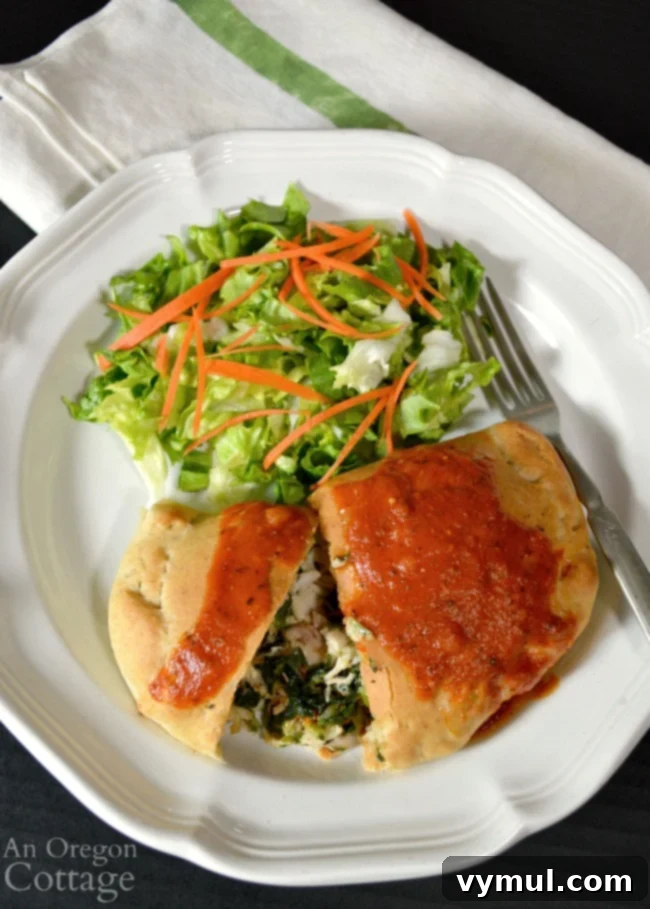 Easy Chicken Spinach Calzone on plate