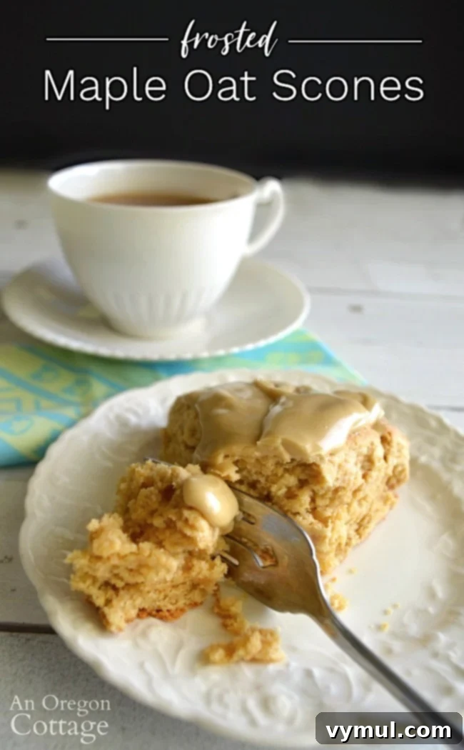 Delicious Frosted Maple Oat Scone served with a cup of tea, ideal for breakfast or a snack