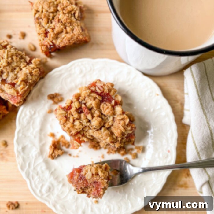 rhubarb bars bite with tea