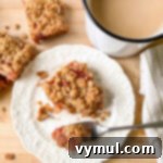 rhubarb bars bite with tea