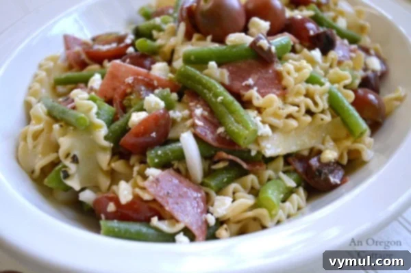 Zesty Greek Pasta Salad with Green Beans and Tomatoes 4 Greek Style Pasta Salad with Green Beans, Tomatoes, Salami and Feta - An Oregon Cottage