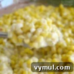 Irresistible Creamy Baked Corn 6 Creamy Corn Bake on spoon