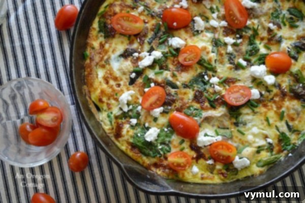 Chicken-Spinach Frittata with Asparagus and Feta, a light yet satisfying meal, fresh from the oven and ready for a weeknight dinner.