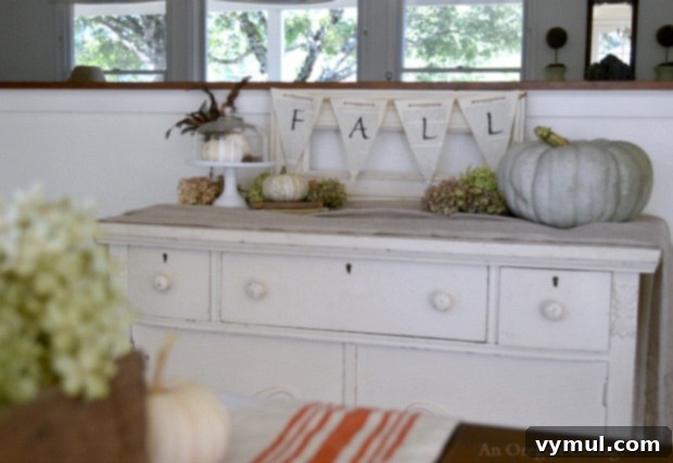 Fall Book Page Banner Sideboard with Jarrahdale Pumpkin and Hydrangeas - An Oregon Cottage