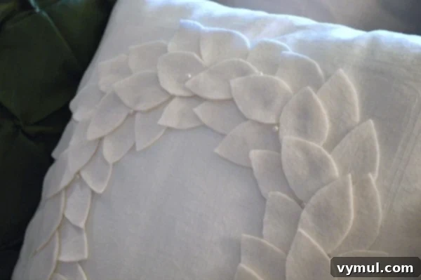 Cozy DIY Felt Wreath Pillow for Winter Decor 9 Felt Leaf and Pearl Wreath Pillow