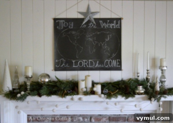 A Cozy Cottage Christmas 2014 12 Joy To The World chalkboard on mantel with greenery, white accents, and mercury glass