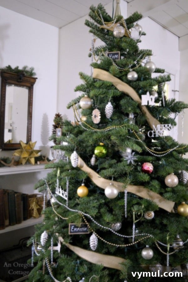 A Cozy Cottage Christmas 2014 14 White, metallic, and burlap themed Christmas tree decorated in a cottage style