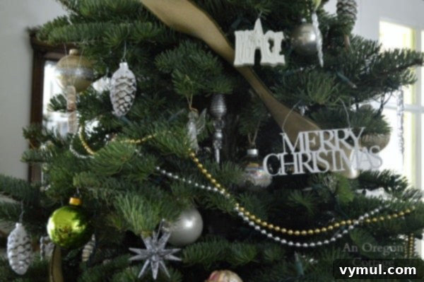 A Cozy Cottage Christmas 2014 15 Cottage Christmas tree with white and metallic ornaments, elegantly decorated