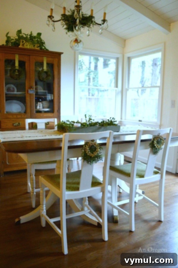 A Cozy Cottage Christmas 2014 6 Quick and easy Christmas wreath chair decorations made from dollar store finds in a cozy dining room setting