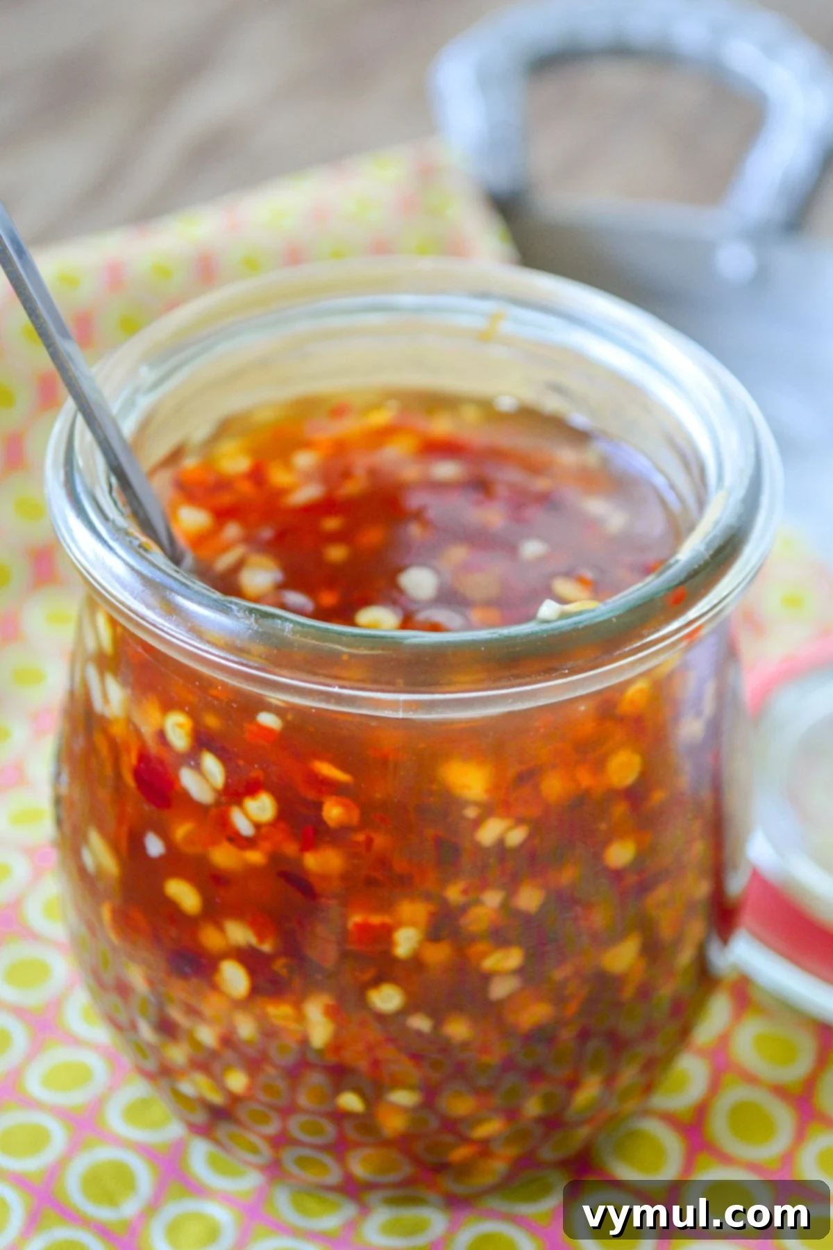 sweet chili sauce in a jar with a spoon