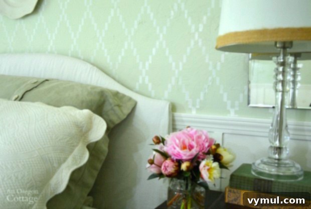 Finished stenciled bedroom accent wall, showcasing the complete trellis pattern