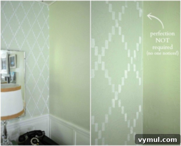 Close-up detail of the stenciled wall in the corner, showing the pattern