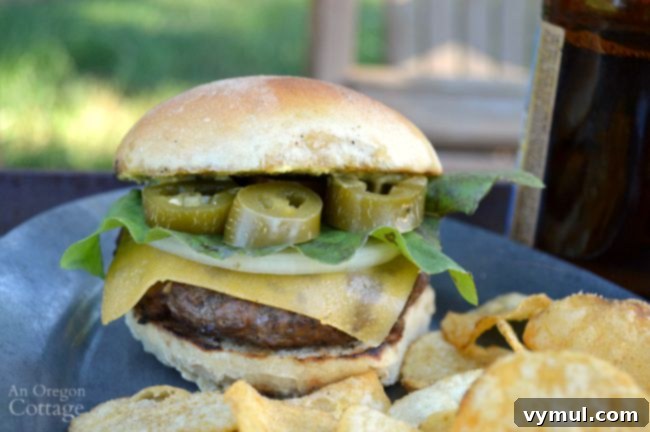 Smashed Garlic Jalapeno Burgers Brewpub Style 4 Smashed Garlic Burgers with (or without!) Jalapeño, showcasing a perfectly grilled patty and bun
