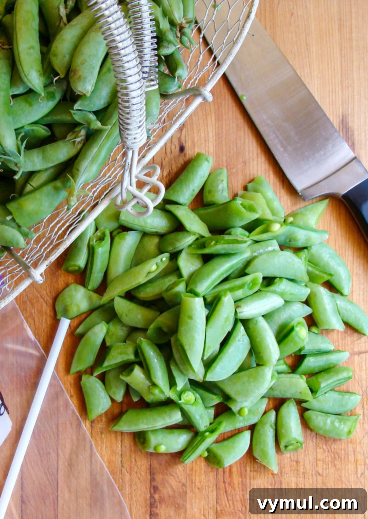 Garden-Fresh All Year: 36+ Ways to Preserve Vegetables by Freezing, Drying, Canning, and Fermenting 4 chopped snap peas ready to be bagged