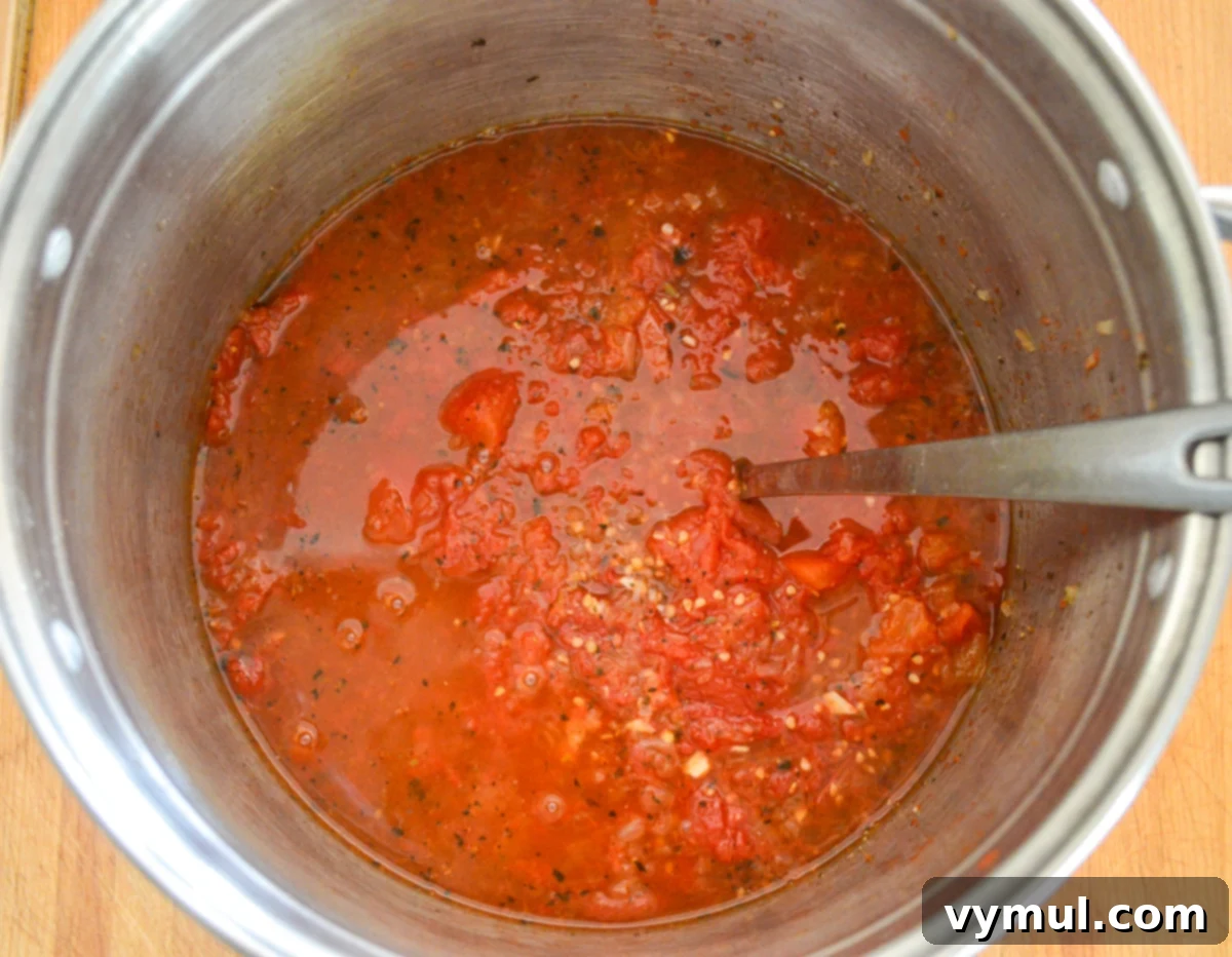 Home Canned Roasted Tomato Sauce 6 roasted tomatoes and seasonings transferred to a stock pot
