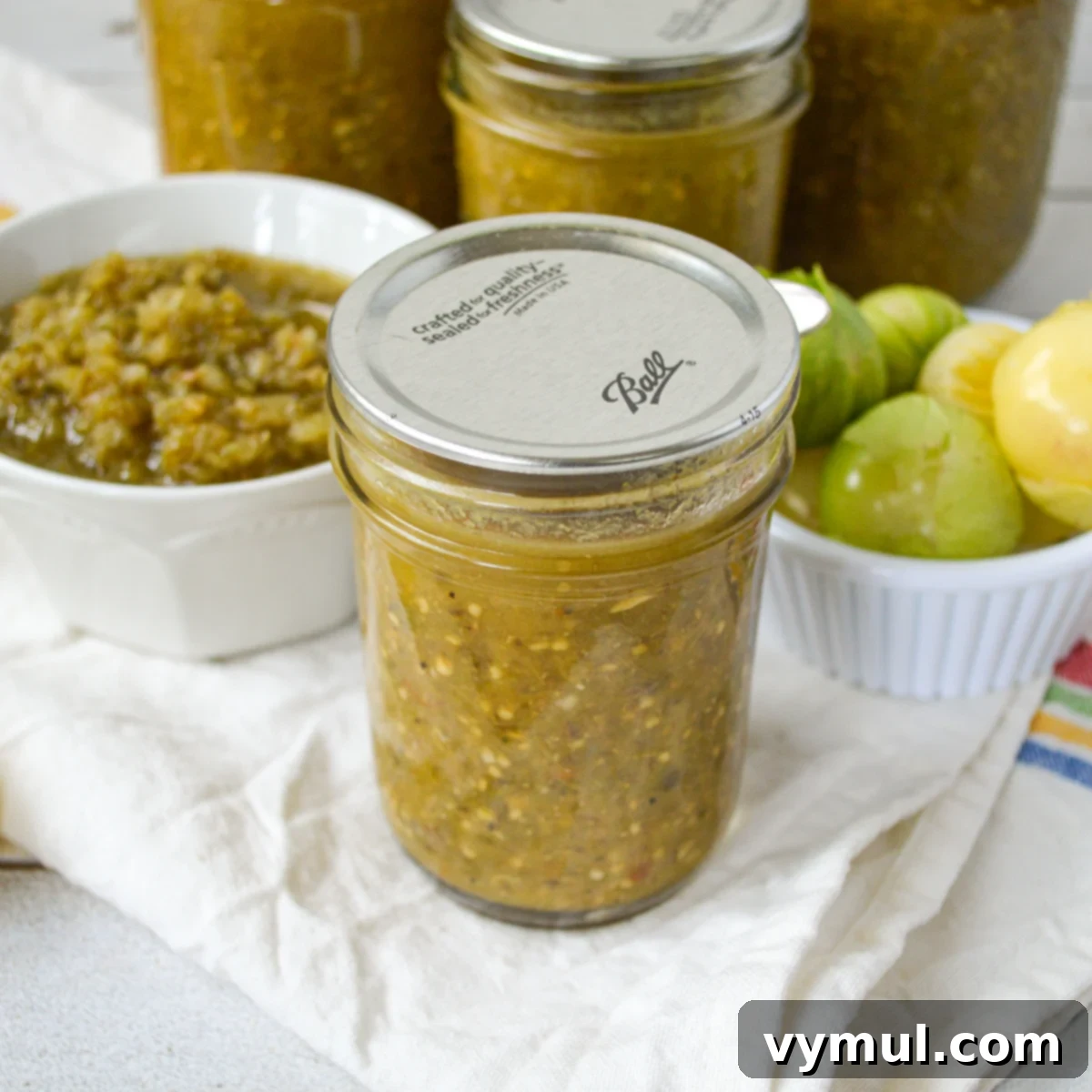 Simple Roasted Salsa Verde: Tomatillo & Green Tomato (Batch & Preserve) 7 jar of canned salsa verde with small bowl of salsa
