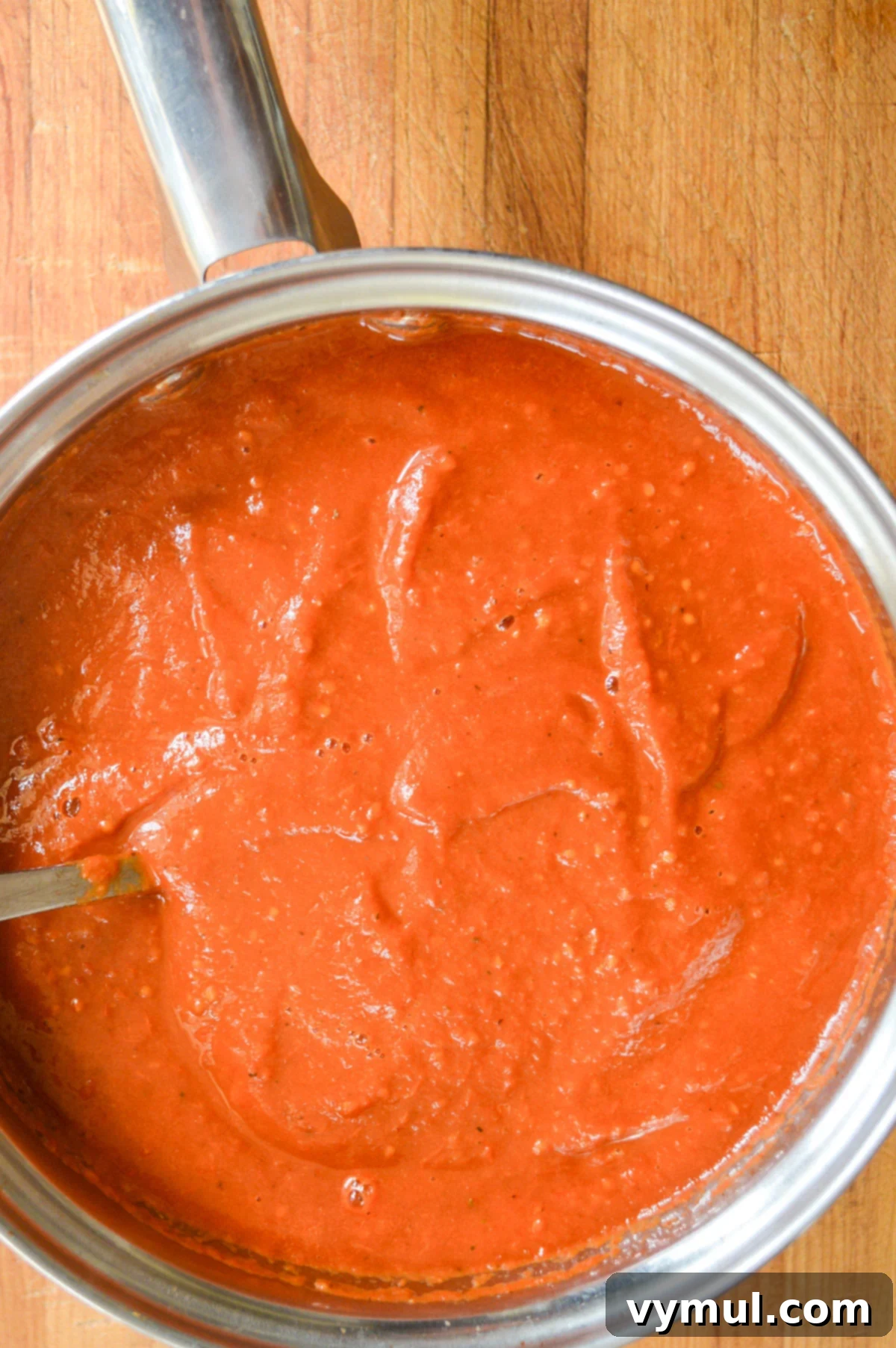 pot of thick roasted cherry tomato sauce