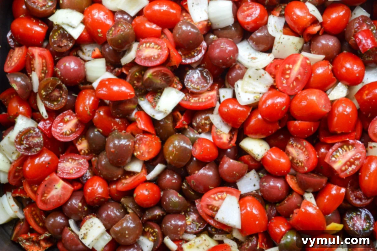cherry tomato sauce ingredients in roasting pan
