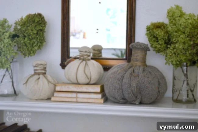 Transform Thrifted Sweaters into Felt Wool Pumpkins 3 Close-up of three DIY felted wool sweater pumpkins with jute twine stems
