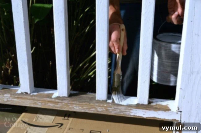 Fall Porch Railing Repaint: Why Now, How To Do It 6 Repaint porch railings-applying quality primer