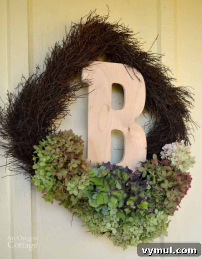 Fall Monogram Hydrangea square wreath for easy fall decor on a porch.