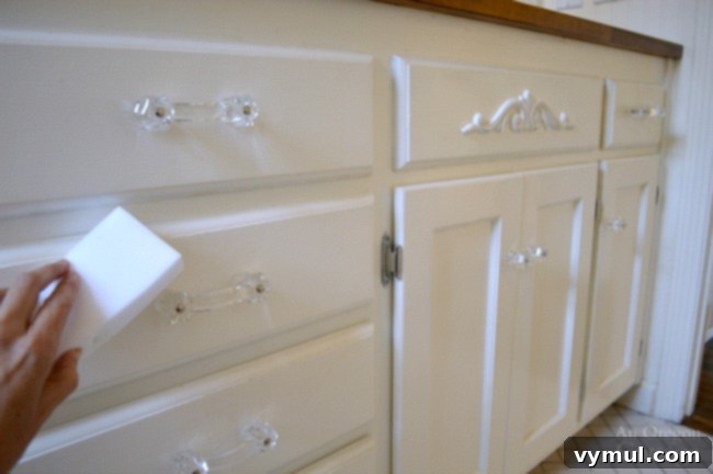 Sustainable Sparkle: Green Cleaning for Your Bathroom 9 Cleaning white vanity with Easy Eraser