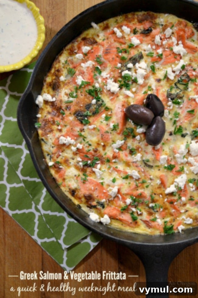 Greek Salmon-Vegetable Frittata - a delicious salmon frittata filled with vegetables and Greek flavors, and topped with a creamy feta sauce