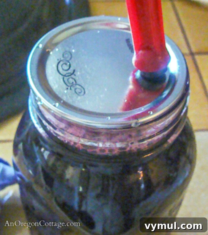 placing lids on jars