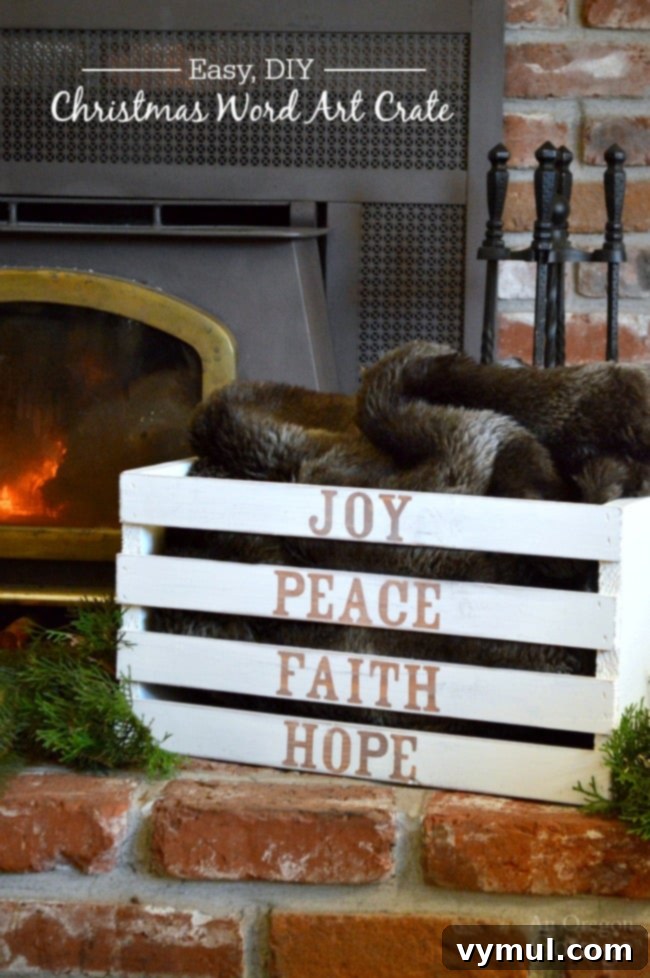 Rustic wood crate painted with holiday words, placed by a cozy fireplace with Christmas decorations.