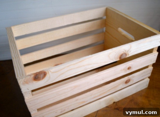 Unfinished wood crate before being painted for DIY Christmas word art project.