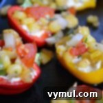 Blistered Mini Peppers with Creamy Cheese and Smoky Corn Salsa 7 Cheese-Stuffed Mini Peppers with Roasted Corn Salsa: a delicious and healthy appetizer.