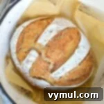 The One-Day Sourdough Secret: Artisan Bread Made Simple 16 sourdough artisan bread baked to perfection in a pot