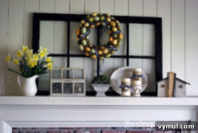 Beautifully styled spring mantelpiece featuring a floral wreath and natural elements