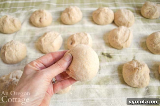shaping sourdough bagel dough balls