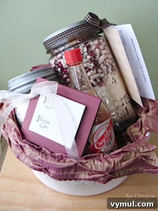 Red Beans and Rice Gift Jar 5 A charming gift basket featuring a Red Beans and Rice gift in a jar alongside a jar of Rosemary Focaccia, arranged in a serving bowl.