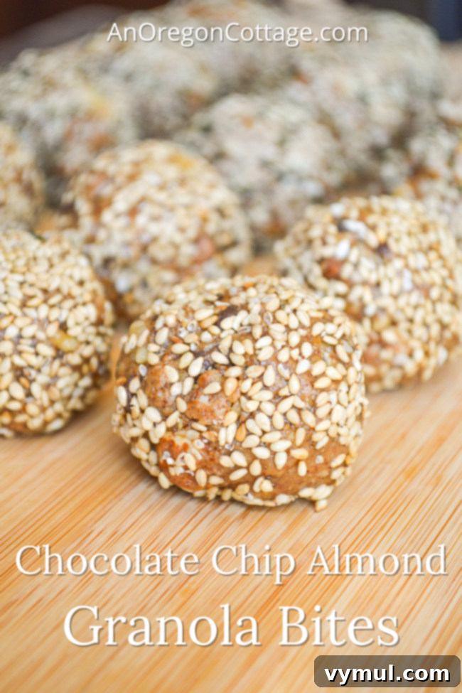 chocolate chip almond granola bites on wood board