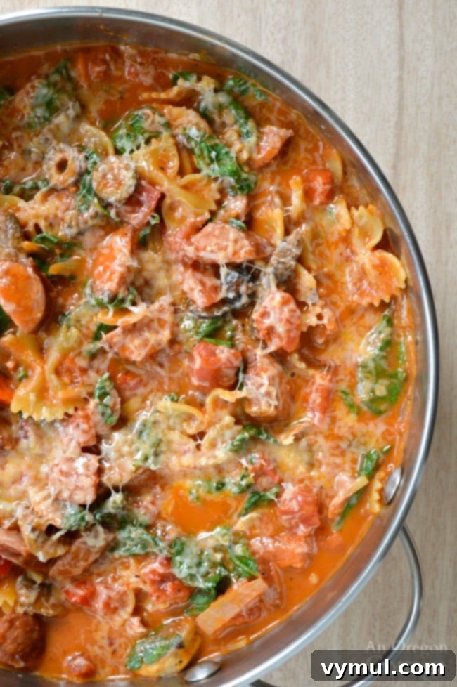 Easy One Pot Italian Pasta with Sausage & Spinach for busy weeknights.
