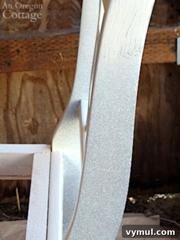 Affordable Handheld Spray Painting Made Easy 6 Using Paint Sprayer - Close-up of Bench Paint Application