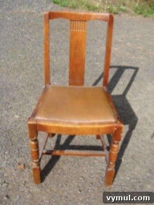 Old Craigslist chair with blocky legs before refinishing