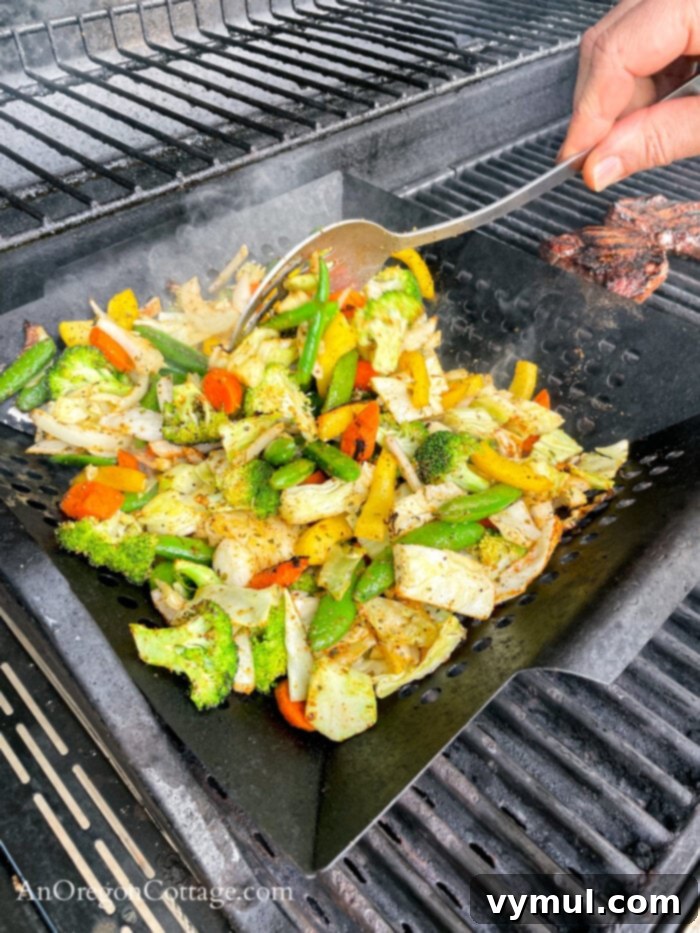 stirring grilled vegetables in basket