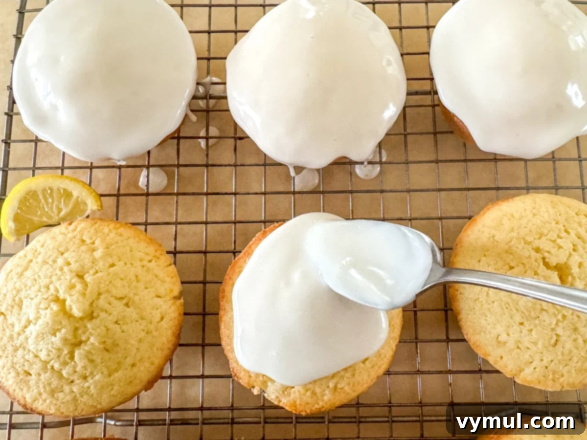 Luscious Lemon Cupcakes with a Sweet Glaze Drizzle 8 glazing cupcakes