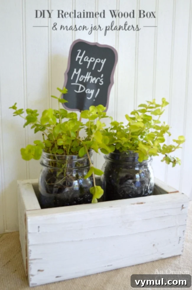 Rustic Reclaimed Wood Planter Featuring Mason Jar Herbs 2 An easy-to-make reclaimed wood box filled with mason jar planters, perfect as a Mother's Day gift or unique home decor item.
