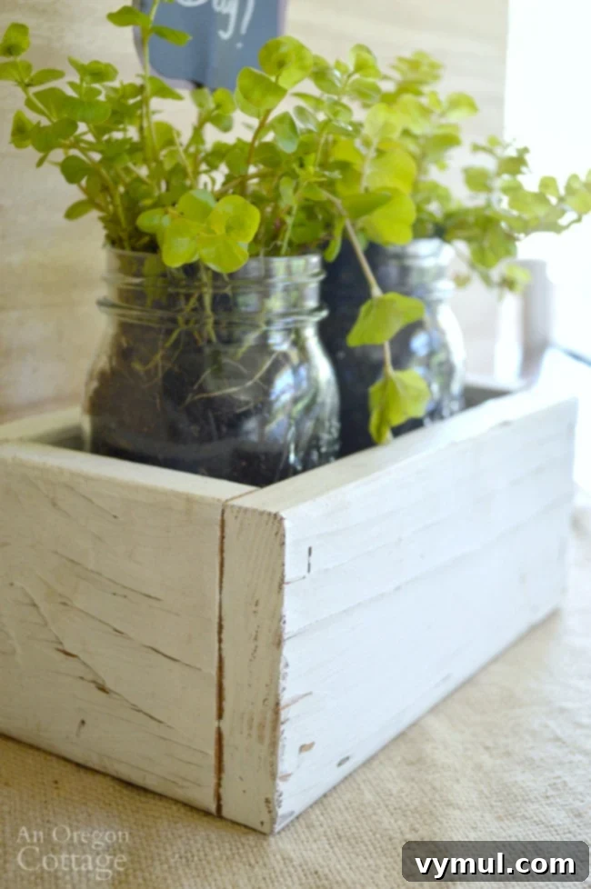 Rustic Reclaimed Wood Planter Featuring Mason Jar Herbs 6 Finished DIY reclaimed wood box ready for planting, showcasing its rustic, imperfect charm.