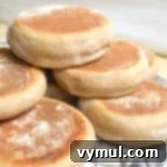 sourdough English muffins on rack