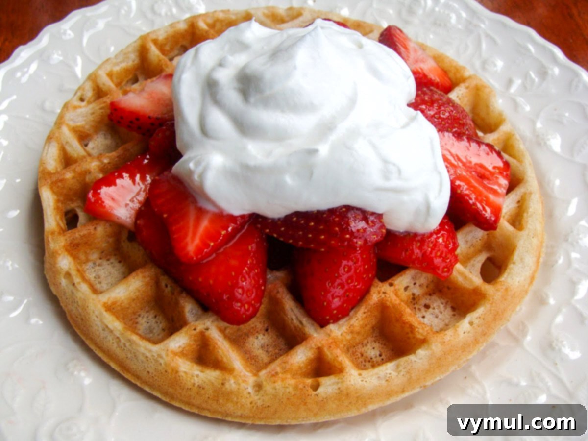 waffles with strawberries and whipped cream